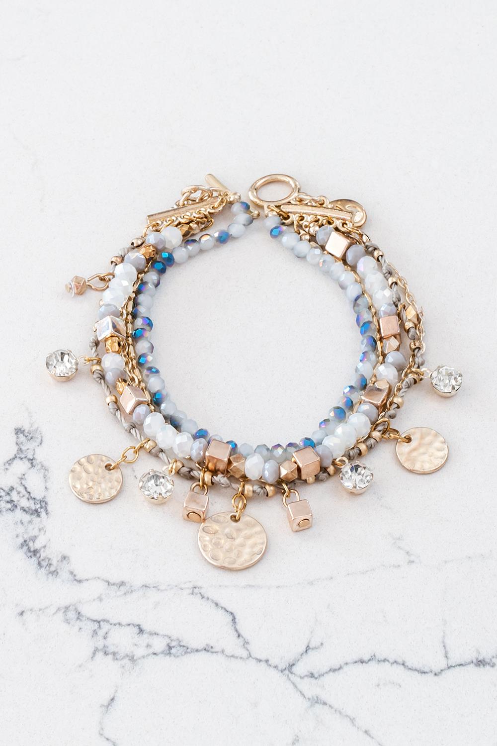 Bracelets > Gold Blue Calypso Bracelet at Baronessa